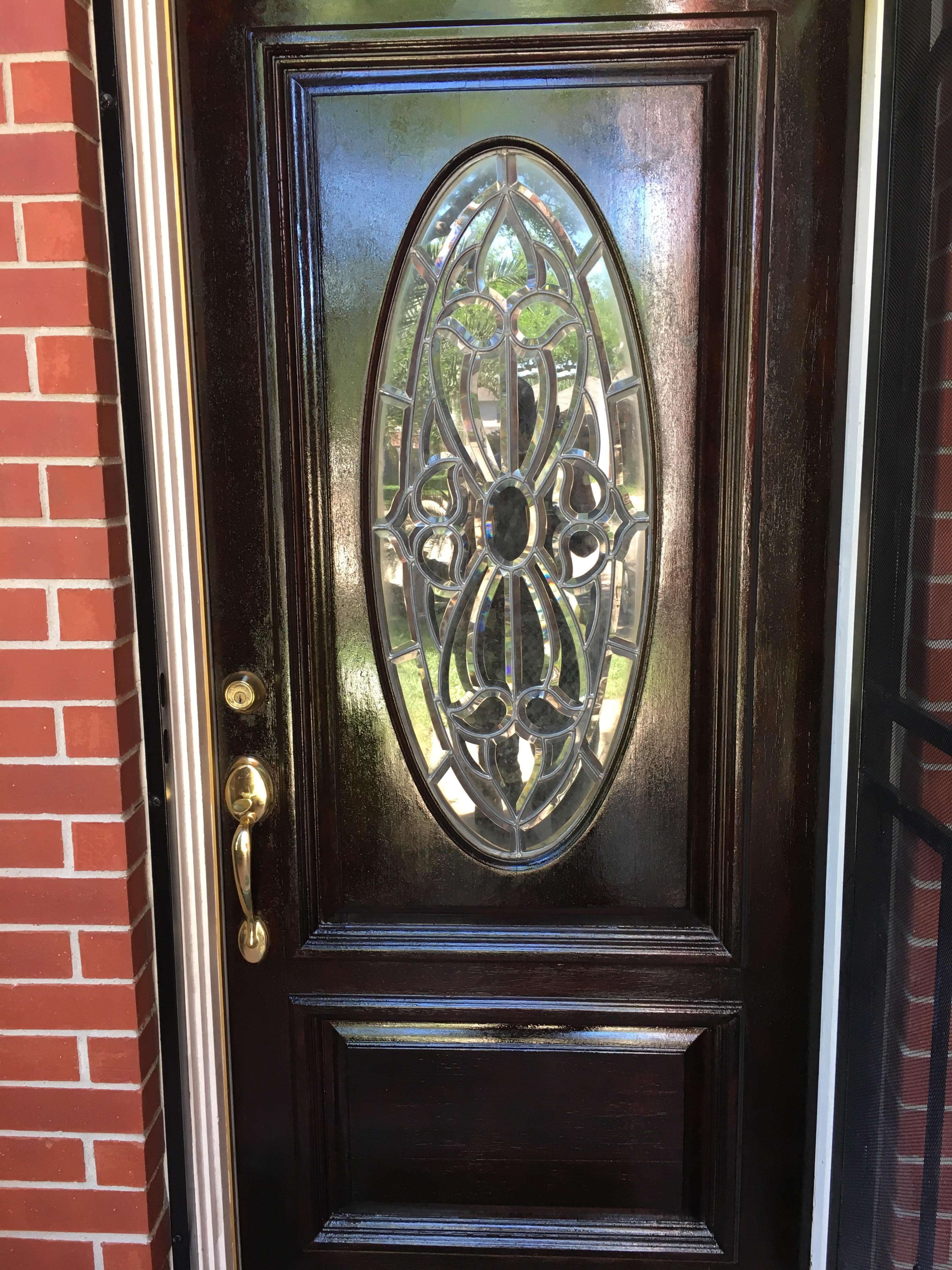 A close up of a door on a brick building